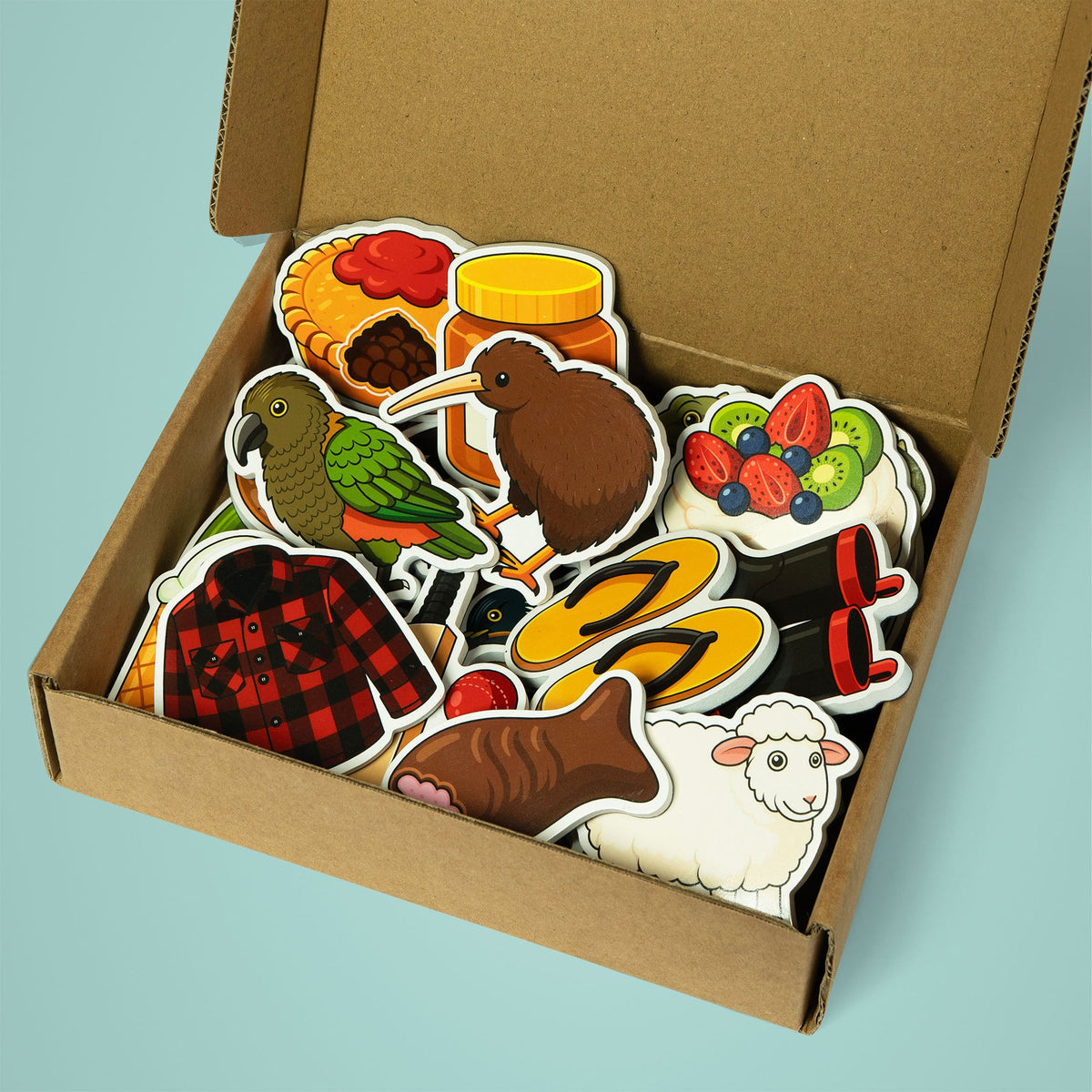 Tiny Kiwi magnet set in its box, updated angled product photo